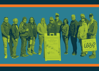 Clean Up group poses for photo outside of Harmon Neighborhood Center